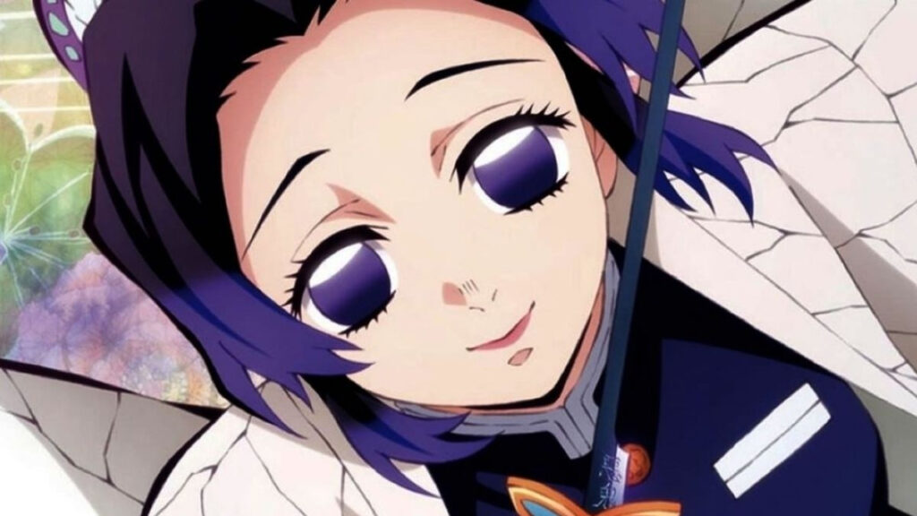 character: kochou_shinobu, A detailed close-up portrait of Shinobu Kocho from Demon Slayer, captured in a medium shot at eye level against a serene forest backdrop. Shinobu stands gracefully, her expression gentle and serene, with beautiful purple compound eyes gazing softly towards the viewer. Her short black hair features gradient purple tips and parted bangs, adorned with a butterfly hair ornament. She wears her traditional Demon Slayer uniform beneath a flowing haori decorated with intricate butterfly wing patterns. Numerous magical, glowing purple butterflies float around her, with several delicately resting on her hands, which are positioned gently in front of her waist. The background depicts a tranquil forest at night, illuminated by soft moonlight filtering through branches, with hanging wisteria flowers adding depth and color. Cinematic lighting highlights her smooth, glossy skin tones and expressive eyes, while clean linework defines her figure. The atmosphere is magical and ethereal, enhanced by soft glowing effects and a cool color palette dominated by purples, blues, and greens.
